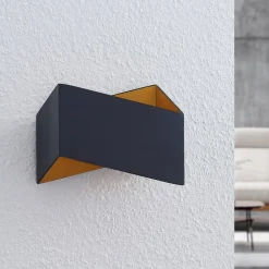 Arcchio Assona væglampe, sort-guld