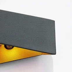 Arcchio Assona væglampe, sort-guld