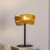 Domiluce Bordlampe Tornado, sort/guld, metal, Ø 26 cm, E14