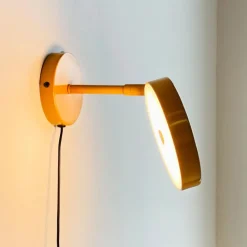 Dyberg Larsen Væglamper>LED-væglampe Starlight, gul, Ø 14 cm dæmpbar