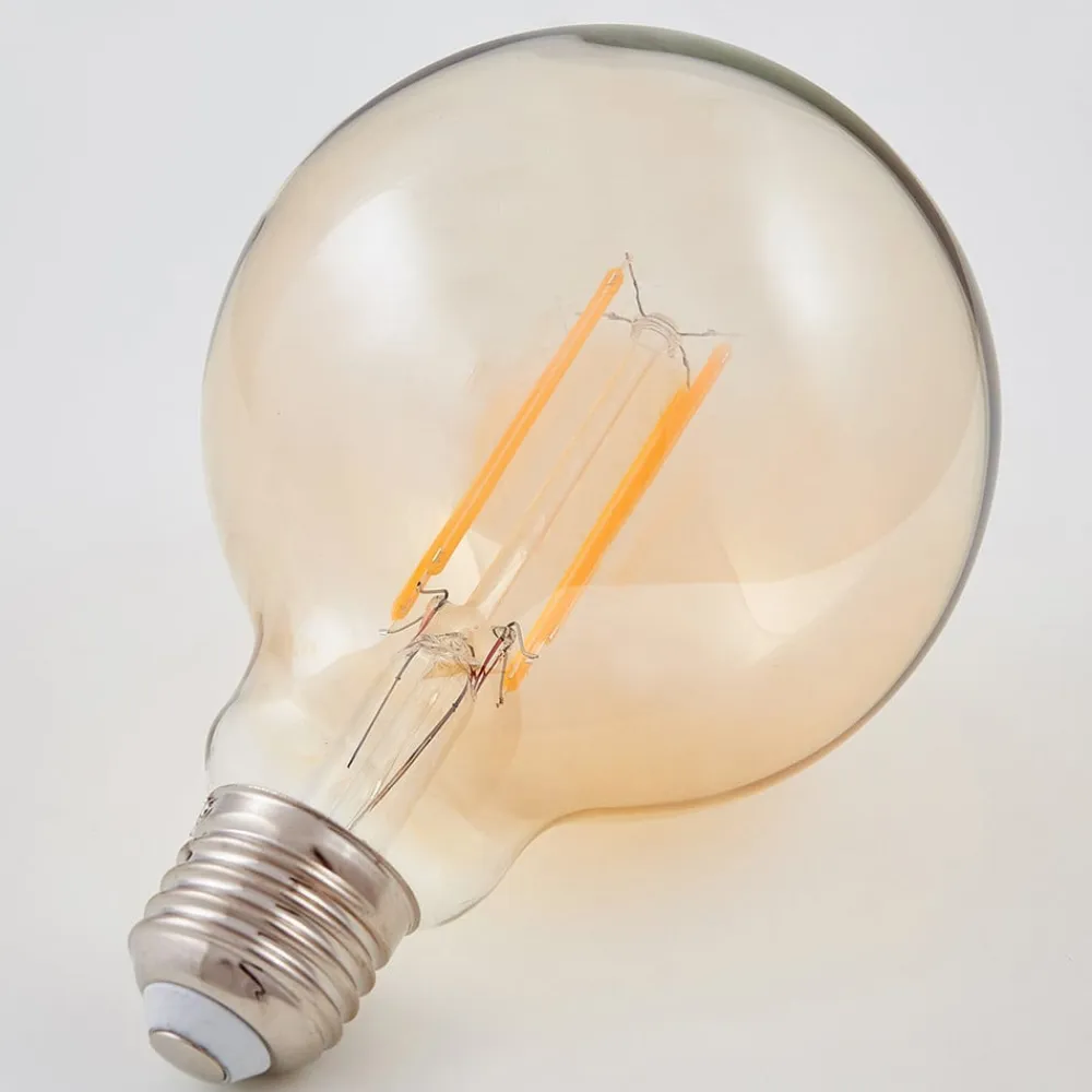 Lindby E27 LED-globepære Filament 6W 500lm, ravfarvet 1.800K