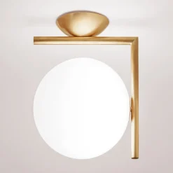 IC C/W1 væglampe, børstet messing^FLOS Hot