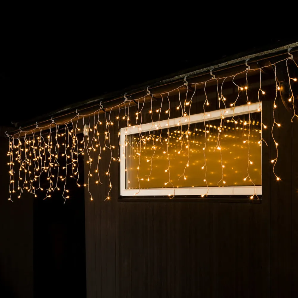 Konstsmide Christmas Julepynt|Lysnet, Lysforhæng>LED lysgardin ice rain amber transp. 5m