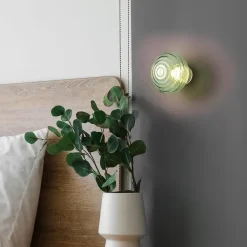 Reality Leuchten LED-væglampe Earl, messing/grøn, glas, Ø 15,5 cm