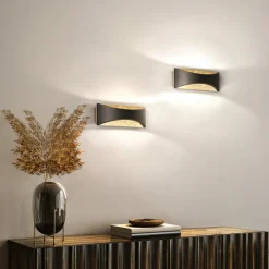 FISCHER & HONSEL Væglamper>LED-væglampe Rio, sort/bladguld, bredde 23 cm, metal