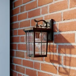 Lindby Charmaine udendørs væglampe, gyldenbrun