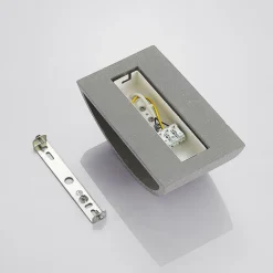 Edvin væglampe af beton, halvrund^Lindby Online