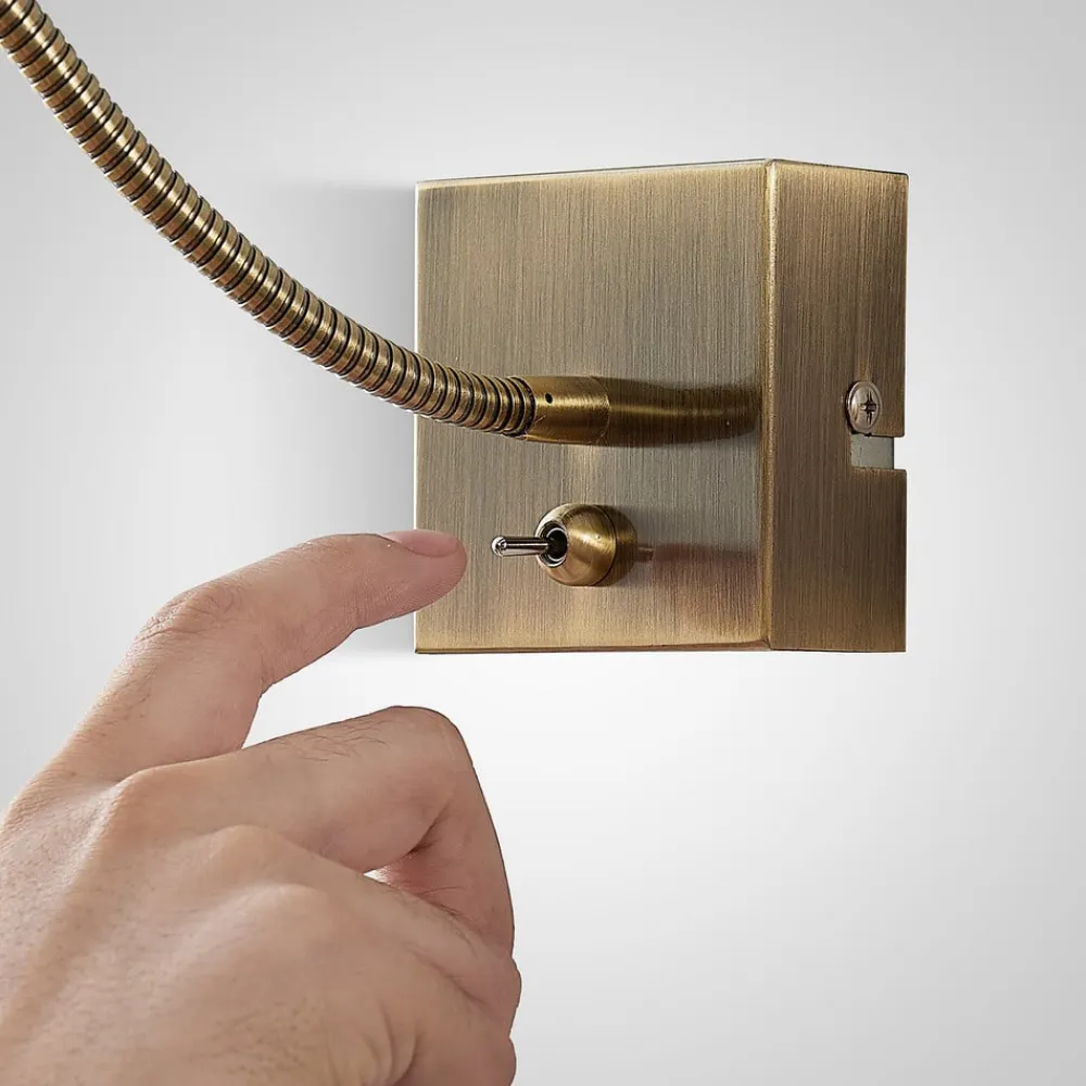 Lindby Jolka LED-læselampe, afbryder, antik messing