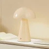 LED genopladelig bordlampe Nevijo, beige, Ø20cm, USB, dæmper^Lindby Sale