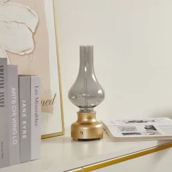 Lindby LED genopladelig bordlampe Maxentius guldfarvet glas dæmper