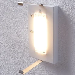 Lindby LED-væglampe Helmi, højde 21 cm, glas, halvcirkelformet