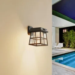 Lindby LED-væglampe Latarka, højde 24 cm, sensor