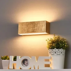 Lindby LED-væglampe Quentin, 23 cm bred, guldfarvet, metal