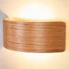 LED-væglampe Rafailia, bredde 23 cm, træ, 3.000 K^Lindby New
