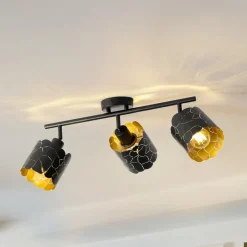 Lindby loftlampe Aralena, sort/guld, 3 lyskilder, længde 70 cm