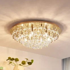 Lindby loftlampe Gillion, 8 lyskilder, guld, krystal, Ø 55cm