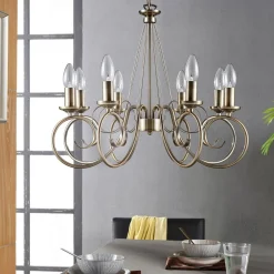 Lindby lysekrone Marnia, 8 lyskilder, Ø 53 cm, antik messing, E14