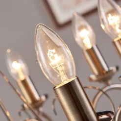 Lindby lysekrone Marnia, 8 lyskilder, Ø 53 cm, antik messing, E14