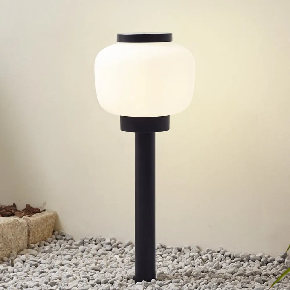 Lindby Terrassebelysning>Orfeas sokkellampe, sort/hvid, aluminium, Ø 24 cm