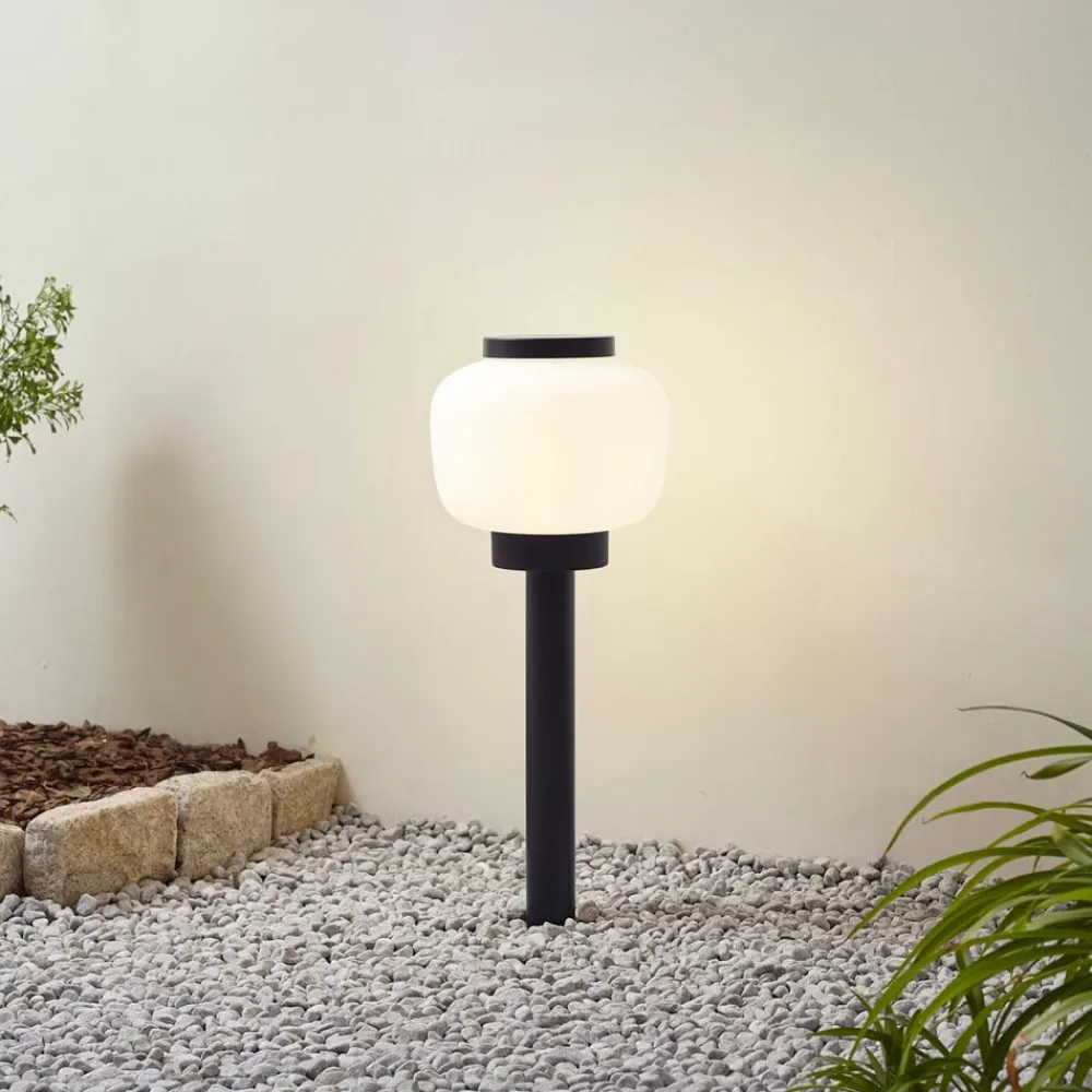 Lindby Terrassebelysning>Orfeas sokkellampe, sort/hvid, aluminium, Ø 24 cm