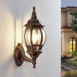 Lindby udendørs væglampe Nadesha, højde 47 cm, børstet guld