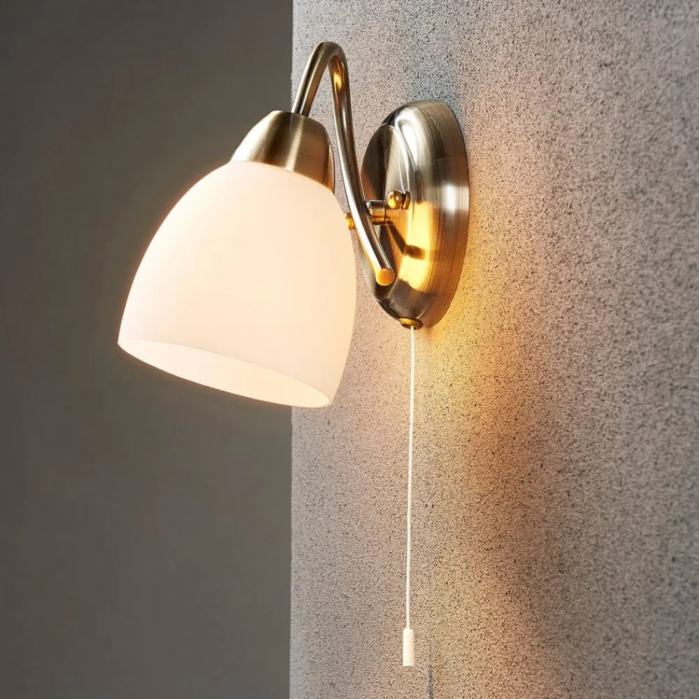 væglampe Mael, højde 20 cm, antik messing, trækkontakt^Lindby Clearance