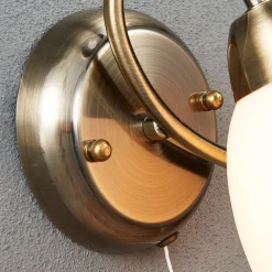 væglampe Mael, højde 20 cm, antik messing, trækkontakt^Lindby Clearance