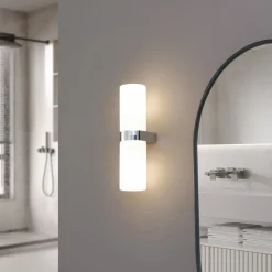 Lucande Basolo væglampe til badeværelset, krom, højde 31,5 cm, glas, IP44