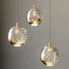 Lucande Pendellamper|Pendellamper>LED-pendellampe Hayley, Ø 25 cm, 3 lyskilder, guld, glas