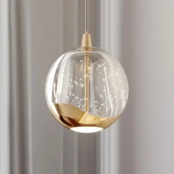 Lucande LED-pendellampe Hayley, Ø 9 cm, guldfarvet, glas