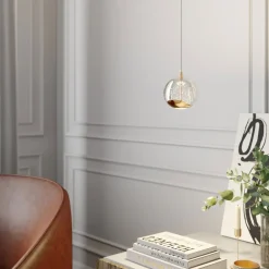 Lucande LED-pendellampe Hayley, Ø 9 cm, guldfarvet, glas