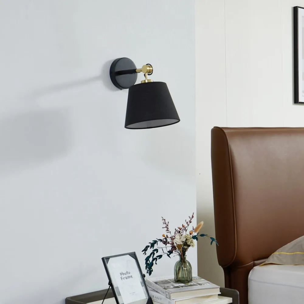 Lucande væglampe Marvaine, sort/guld-farvet, justerbar