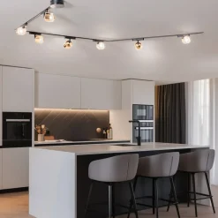 Lindby Lumaro skinnesystem, spots, 7 lyskilder, guld, Ø8cm,48V,dæmpbar