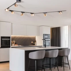 Lindby Lumaro skinnesystem, spots, 7 lyskilder, guld, Ø8cm,48V,dæmpbar