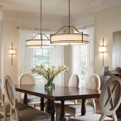 KICHLER Mona LED-væglampe, IP44, højde 55,9 cm, fortinnet