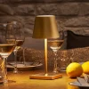 Sigor Nuindie mini LED genopladelig bordlampe, USB-C, guld, IP54, dæmpbar