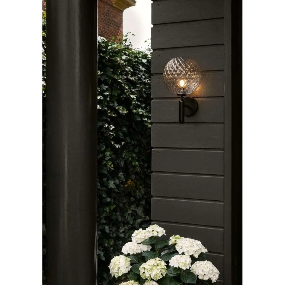 Nuura udendørs væglampe Miira, Ø 20 cm, sort/klar^Nuura Aps