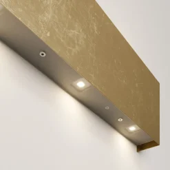 Quitani LED-væglampe Maja, guld antik, bredde 54 cm