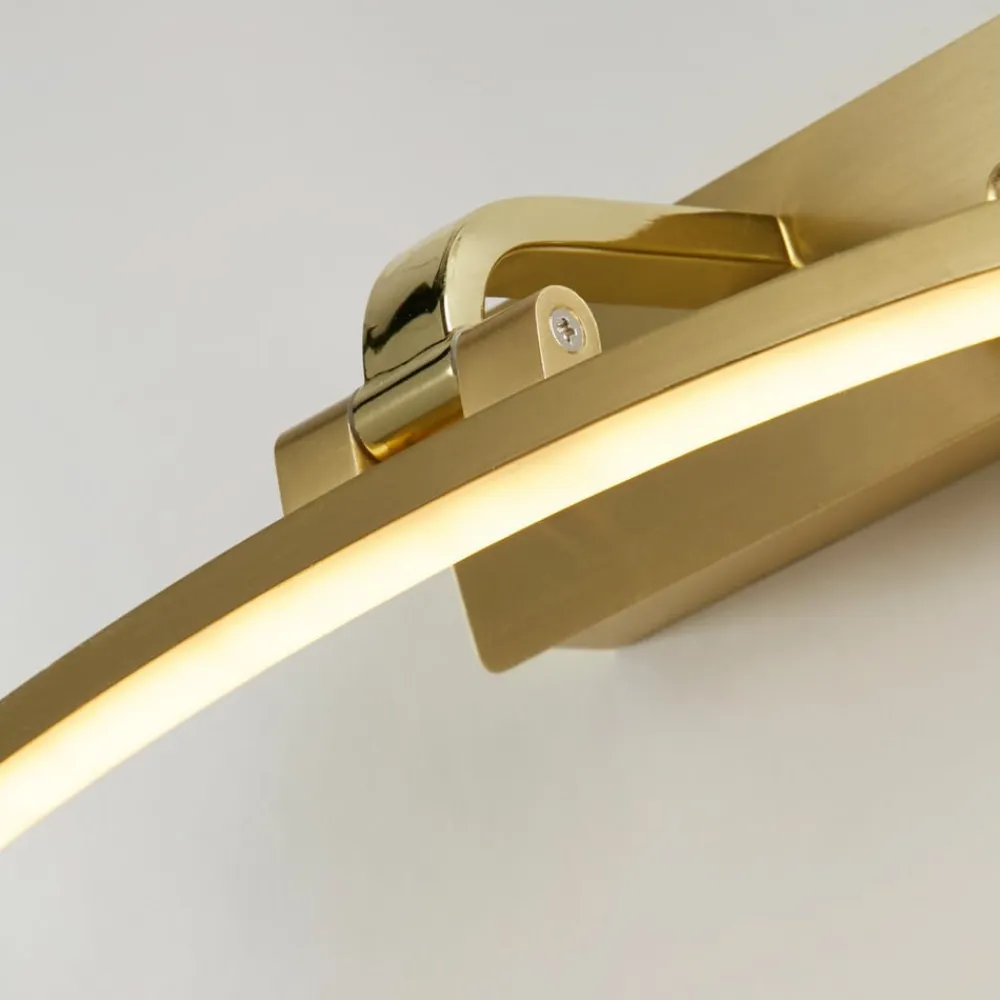 Searchlight Santorini LED-væglampe, bredde 40 cm, messing, vipbar