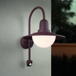 Trio Lighting Sensor-udendørs væglampe NORMAN, rust, Ø 30 cm metal/glas IP44
