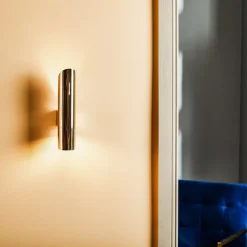 Væglampe Ana, op/ned, messing^Argon New