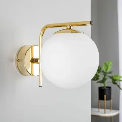 Domiluce Væglampe Aurora, guldfarvet, glas, 17 cm høj, kugle, E14