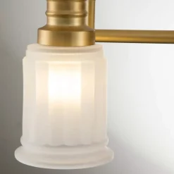 QUOIZEL Væglampe Swell IP44, 3-lys, børstet messing